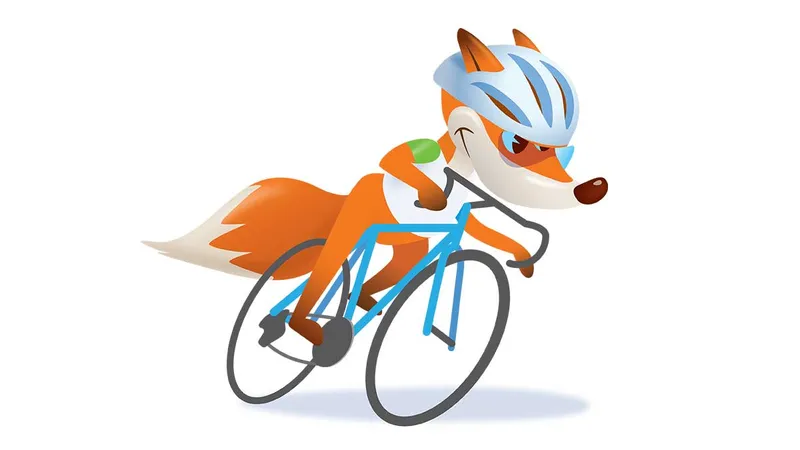 Risanka lisice na kolesu nosi čelado in se hitro vozi.